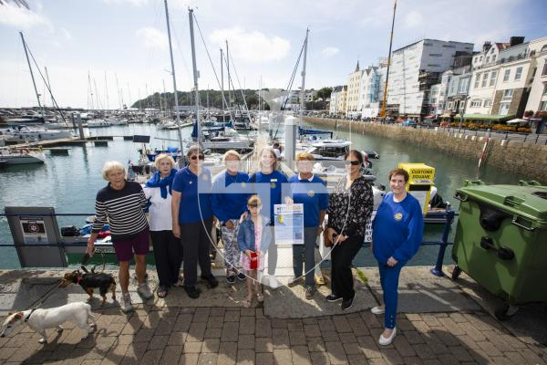 Picture by Peter Frankland. 23-08-24 Launch of the first 'PortBin'. Hugo the Harbour Hoover was named by 8 year old Olivia Bishop and paid for by Rotary Guernesiais.