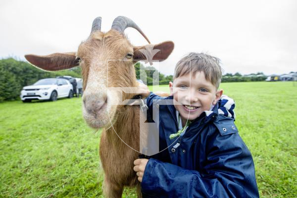 Picture by Peter Frankland. 24-08-24 Guernsey Goat Show at Le Chene. Joe Corr, 10 with Cara the goat.