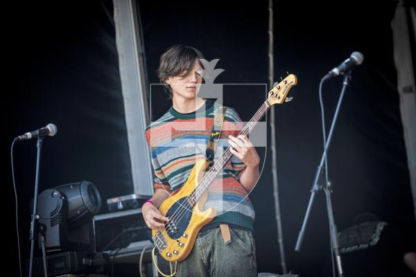 Picture by Peter Frankland. 23-08-24 The Vale Earth Fair 2024. A Bean Jar Jam (some friends who had never played together before). Ruairi Byrne, 16