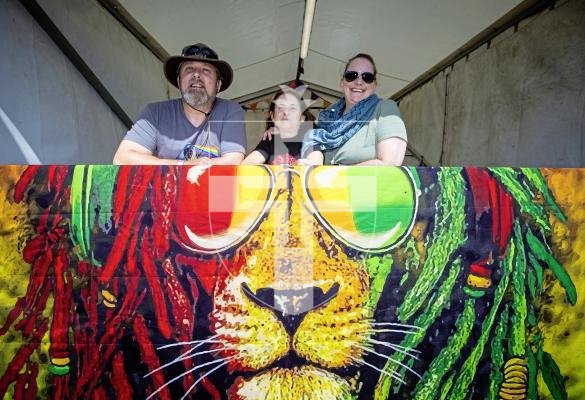 Picture by Peter Frankland. 23-08-24 The Vale Earth Fair 2024. L-R - Phil Hickman, Sarah Payne and Claire Pasquire working at 'The Can Bar'.