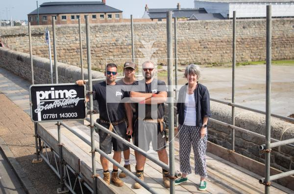 Photo by Erin Vaudin. 30.08.24. From left to right, Frank Le Tissier, Corey Greening, James Marquis and Odette Duerden, Havelet Regatta Committee member. Prime Scaffolding are installing a ramp for wheelchair users at the Havelet Regatta.