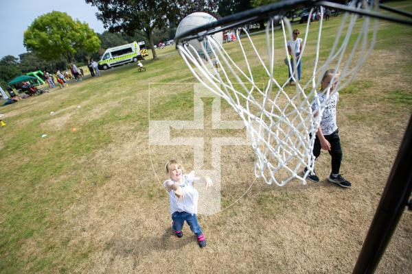 Picture by Karl Dorfner. 31-08-2024 - The Sauzmarez Park Sports Day Event - Eva Santos (6) Working on her netball aim