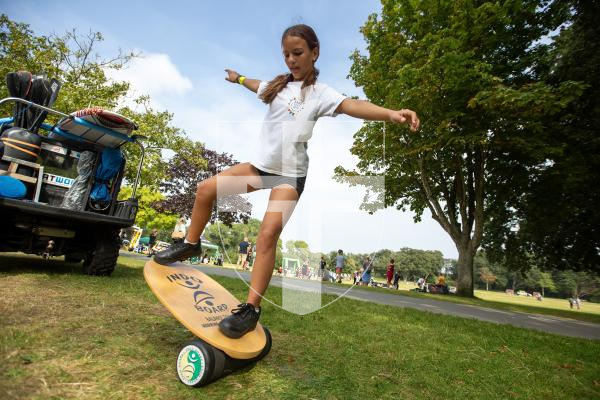 Picture by Karl Dorfner. 31-08-2024 - The Sauzmarez Park Sports Day Event - Zoe pollard (11) Showing off her skills on the balance board, which is used as training for surfing and other sports