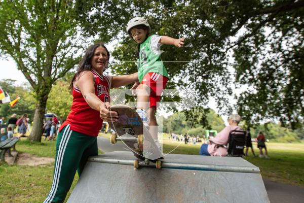 Picture by Karl Dorfner. 31-08-2024 - The Sauzmarez Park Sports Day Event - Aurora McConnell (6) with mum Angelique learning how to drop in on the ramps