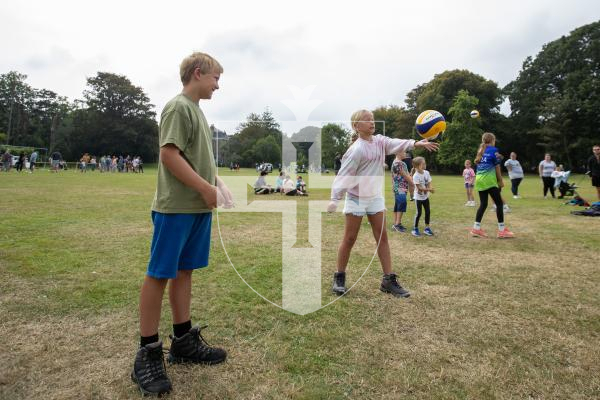 Picture by Karl Dorfner. 31-08-2024 - The Sauzmarez Park Sports Day Event - Max Looijenga (11) and sister Alice Looijenga (9) trying their hands at serving with the volleyball team