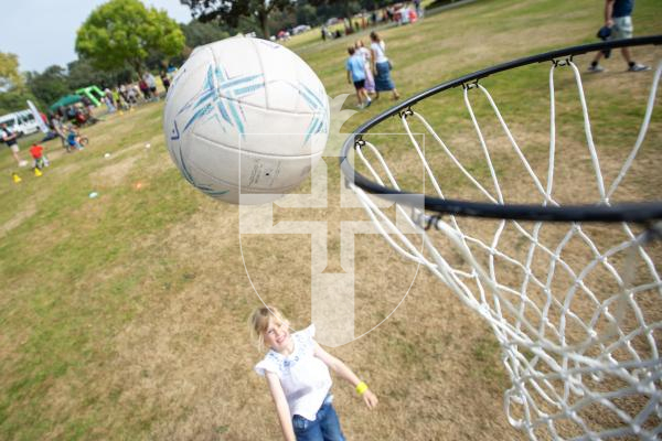 Picture by Karl Dorfner. 31-08-2024 - The Sauzmarez Park Sports Day Event - Eva Santos (6) Working on her netball aim