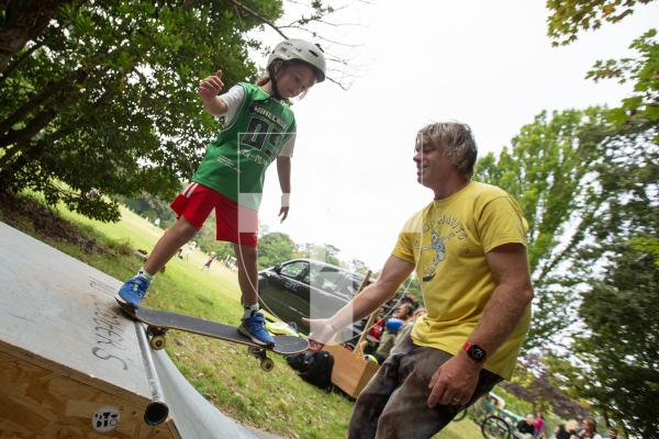 Picture by Karl Dorfner. 31-08-2024 - The Sauzmarez Park Sports Day Event - Aurora McConnell (6) with Tim Gaudion learning how to drop in on the ramps