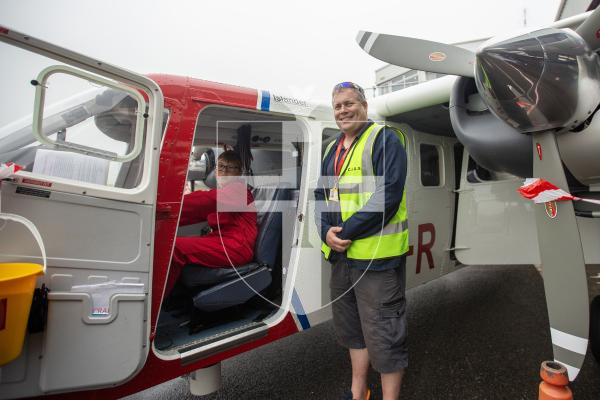 Picture by Karl Dorfner. 01-09-2024 - Aero Club Wings and Wheels Event - Casper Green (12) in the air search and rescue cockpit with Mark Seabrooke the organiser