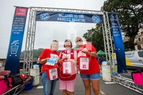 Picture by Karl Dorfner. 01-09-2024 - Havelet Regatta - L/R - Jeannie Torode, Debbie Robinson and Rhona Humphreys who were collecting support money at the entrance to the event