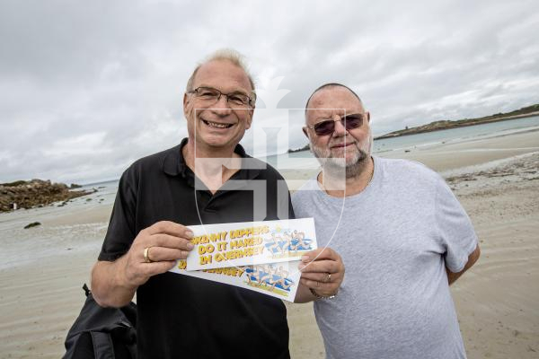 Picture by Sophie Rabey.  08-09-24.  Charity fundraising skinny dip took place at Pembroke, raising money or the Pink Ladies, MUG, and The Guernsey Society for Cancer Relief.
Organisers Ian Tonks and Peter Leigh.