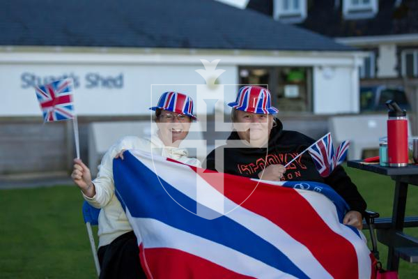 Picture by Karl Dorfner - KGV - Proms on the wicket event - Jo Hardill and Claire Penney enjoying the event and warming up with a flask of tea