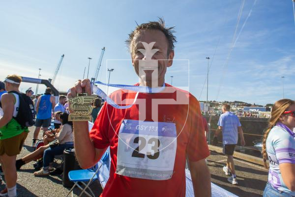 Picture by Karl Dorfner. 15-09-2024 - The Half Marathon - Mark Morgan,64, who was one of the older runners to finish early.