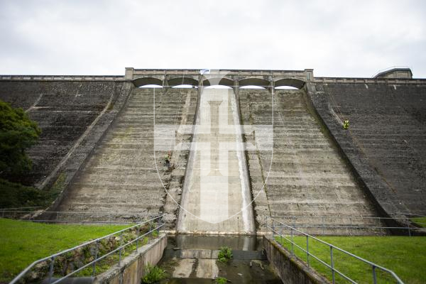 Picture by Sophie Rabey.  04-09-24.   Geomarine have started work on clearing the dam wall of St Saviours Reservoir, removing the weeds and debris that has built up over the last few years.
Lewis Battle and John White.