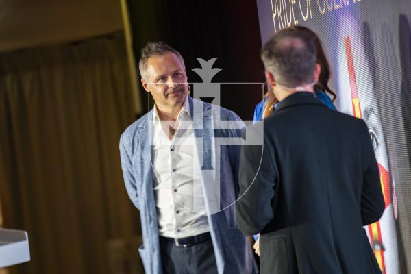 Picture by Sophie Rabey.  07-10-23.  Pride of Guernsey 2023 Awards at St Pierre Park.
Andy and Jo Priaulx with Carl Ward.