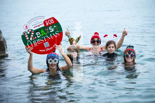 Picture by Luke Le Prevost. 29-11-23.
Preview for Les Bourgs Hospice 12 Bays of Christmas fundraiser launching on the 1st December, pictured at Rousse Pier. L-R Liz Stonebridge (fundraising administrator), Jack Sealey (10), Kerry Marley, Jude Marley (9) and Dawn Sealey