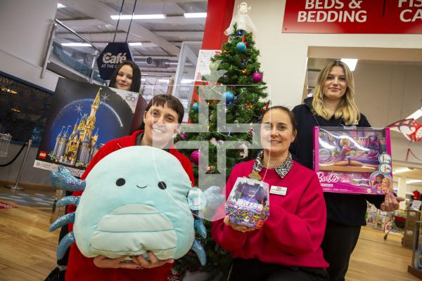 Picture by Luke Le Prevost. 30-11-23.
Aladdin's Cave with some of the most popular toys selling this Christmas.  L-R sales assistant Maddi Collenette with Lego Disney, sales assistant Amanda Vidamour with Squishmallows, operations director Natalie Maides with Bitzee and sales assistant Ruby Palmeri with Barbie