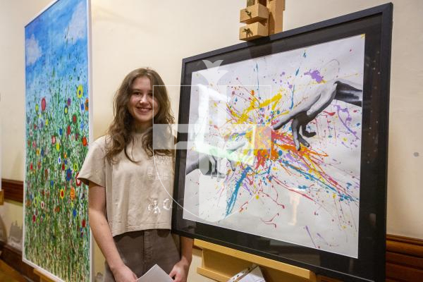 Picture by Luke Le Prevost. 29-11-23.
Sovereign Art Foundation Students Prize exhibition, auction and awards at St James. Alexia Nour Ratl (16) with 'The Creation of Colour'