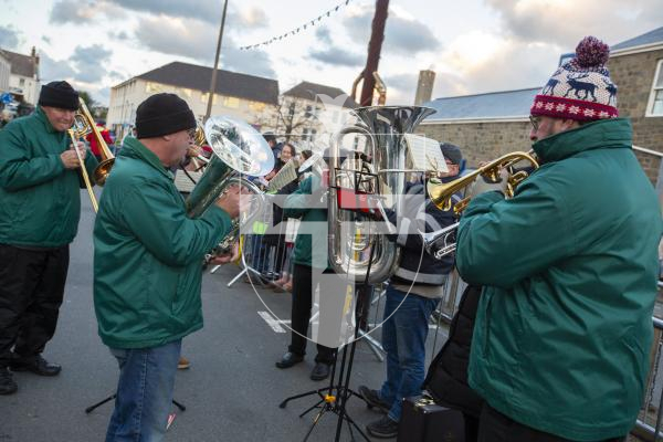 Picture by Luke Le Prevost. 01-12-23.
Santa Claus arrived at the Bridge in a fire engine to switch on the Christmas Lights. Guernsey Concert Band