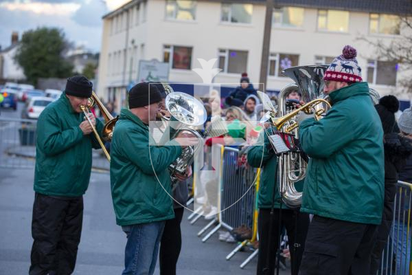 Picture by Luke Le Prevost. 01-12-23.
Santa Claus arrived at the Bridge in a fire engine to switch on the Christmas Lights. Guernsey Concert Band