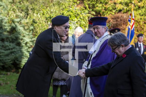 Picture by Luke Le Prevost. 03-12-23.
Royal Guernsey Light Infantry (RGLI) Annual Parade & Remembrance Service at the Sunken Gardens. L-R Chris Oliver shakes hands with Deputy John Gollop