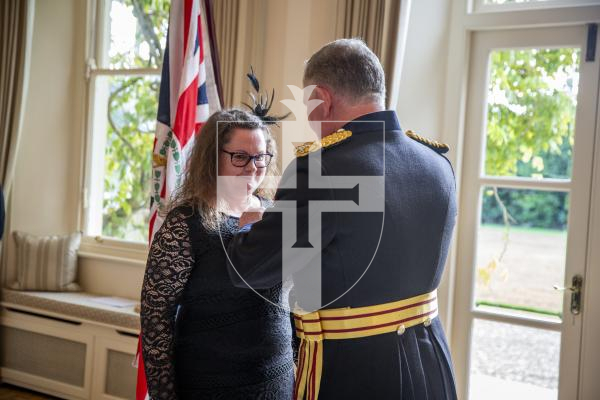 Picture by Luke Le Prevost. 02-12-23.
Investiture of Lucy Beere who received her MBE, by the Lieutenent Governor at Government House, for her sporting achievements. L-R Lucy Beere and Lt Governor Richard Cripwell