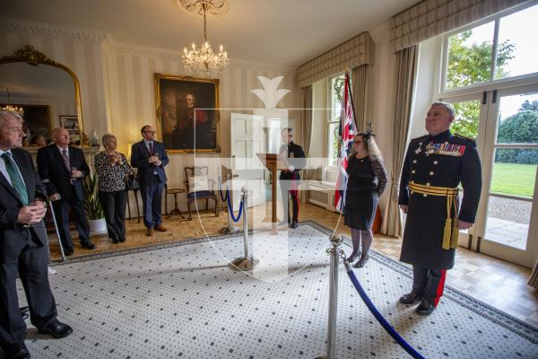 Picture by Luke Le Prevost. 02-12-23.
Investiture of Lucy Beere who received her MBE, by the Lieutenent Governor at Government House, for her sporting achievements. L-R Major Marco Ciotti, Lucy Beere and Lt Governor Richard Cripwell