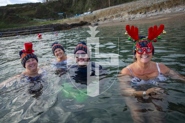 Picture by Luke Le Prevost. 02-12-23.
Swimmers gathered at La Valette Bathing Pools to take part in 12 Bays for Christmas, raising money for Les Bourgs Hospice. L-R Lisa Lorier, Jayne Evans, Luke Bihet and Marina Burr from the Guernsey Bluetits group
