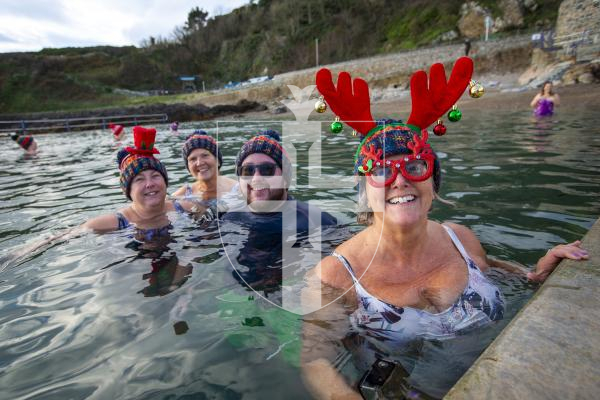 Picture by Luke Le Prevost. 02-12-23.
Swimmers gathered at La Valette Bathing Pools to take part in 12 Bays for Christmas, raising money for Les Bourgs Hospice. L-R Lisa Lorier, Jayne Evans, Luke Bihet and Marina Burr from the Guernsey Bluetits group