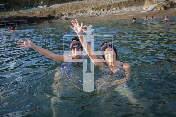 Picture by Luke Le Prevost. 02-12-23.
Swimmers gathered at La Valette Bathing Pools to take part in 12 Bays for Christmas, raising money for Les Bourgs Hospice. L-R Amy Ford and Kate Trow