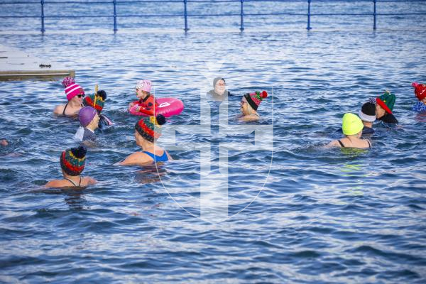Picture by Luke Le Prevost. 02-12-23.
Swimmers gathered at La Valette Bathing Pools to take part in 12 Bays for Christmas, raising money for Les Bourgs Hospice. Swim All Seasons