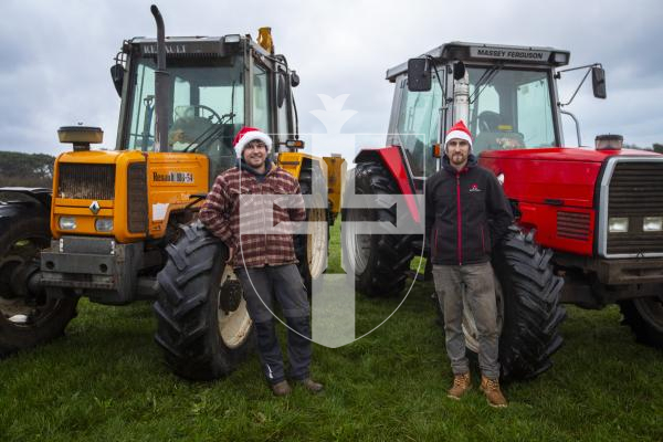 Picture by Luke Le Prevost. 30-11-23.
This year's Christmas Tractor Run, which sees tractors in lights and decoration parade around the island, will take place on Saturday 16 December. L-R Co-organisers Ben Le Page and Peter Reddall