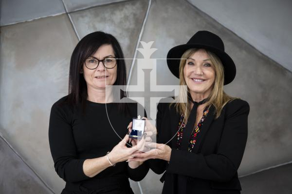 Picture by Luke Le Prevost. 30-11-23.
Bijoux Boutique for features - two staff members have been presented with gifts for reaching milestones working for the hairdressers business. L-R Sharon Hughes receives her gift from Lynne Kendal-Falla for reaching 20 years