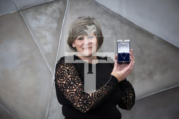 Picture by Luke Le Prevost. 30-11-23.
Bijoux Boutique for features - two staff members have been presented with gifts for reaching milestones working for the hairdressers business. Jean Le Tissier receives her gift for reaching 27 years