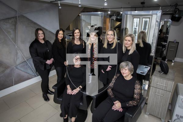 Picture by Luke Le Prevost. 30-11-23.
Bijoux Boutique for features - two staff members have been presented with gifts for reaching milestones working for the hairdressers business. L-R Front row sitting: Sharon Hughes and Jean Le Tissier reached 20 and 27 year milestones respectively. Back row standing: Aaliyah Brouard, Emily McCartney, Sinead De Sousa, Lynne Kendal-Falla, Kimberly Allen and Kristine Greening