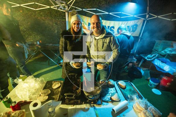 Picture by Luke Le Prevost. 06-12-23.
Winter Wonderland 2023 hosted at the Bachmann's home Les Ruettes Cottage, St Saviours. The event is sponsored by Specsavers, and raises money for the Lions Club of Guernsey and Autism Guernsey. L-R Louise and Nick Bachmann (daughter-in-law and son of home owners Peter and Frankie Bachmann) serving burgers.