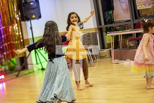 Picture by Sophie Rabey.  16-03-24.  Holi - Festival of Colours - celebration at Cobo Community Centre.  A series of perfomances were played out to explain the story of the famous Hindu festival.
L-R Sanvi Singh (6) and Thaarini Rao (7).