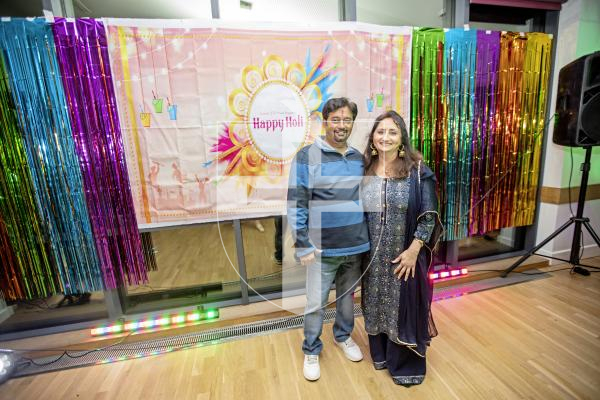 Picture by Sophie Rabey.  16-03-24.  Holi - Festival of Colours - celebration at Cobo Community Centre.  A series of perfomances were played out to explain the story of the famous Hindu festival.
Dev and Chaya Singh.