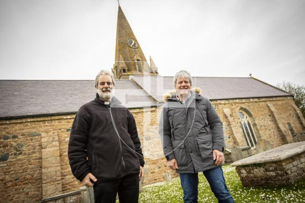 Picture by Sophie Rabey.  28-03-24.  The Rt Revd Nick Drayson and Chris Workman at Castel Church ahead of clocks go forward this Sunday.  The chuch is having some work done on the clocks.