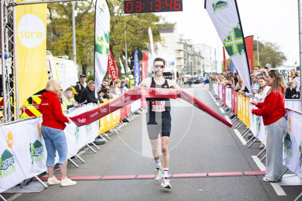 Picture by Sophie Rabey.  14-04-24.  Sure Guernsey Marathon 2024.
First in from the Relay Race.