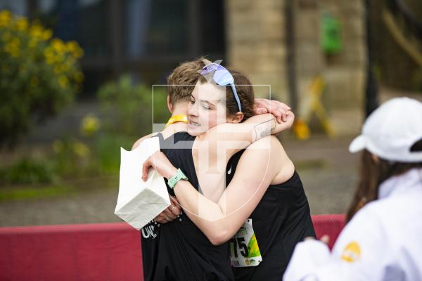 Picture by Sophie Rabey.  14-04-24.  Sure Guernsey Marathon 2024.
Ethan Woodhead (first Guernsey Male finisher) and Lindsay Sword (first Guernsey Female finisher)