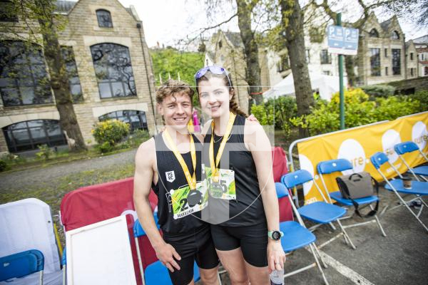 Picture by Sophie Rabey.  14-04-24.  Sure Guernsey Marathon 2024.
Ethan Woodhead (first Guernsey Male finisher) and Lindsay Sword (first Guernsey Female finisher)