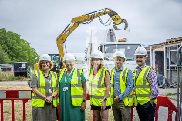 Picture by Peter Frankland. 27-06-24 Demolition of Les Ozouets Campus has started. The former St Peter Port school site is coming down to make way for The Guernsey Institute flagship campus. L-R - Louise Misselke, Principal of Guernsey Institute, Jacki Hughes, Executive Principal of Guernsey Institute, Dr Tracey McClean, Head of The Institute of Health and Social Care Studies, Simon Le Tocq, CEO of GTA University Centre and Ashley Dupre, Head of Education Capital Projects.