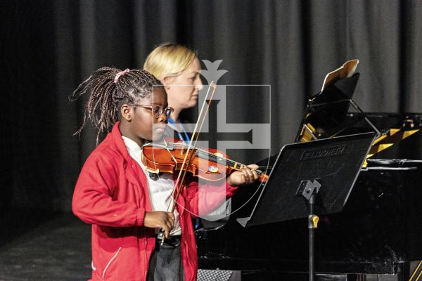 Picture by Sophie Rabey.  06-03-25.  Guernsey Eisteddfod 2025 at Beau Sejour. 
Friday 7th March - Morning Session.  Class M041.  Violin Under 11. (The Shawland Cup)
Praise Oyewale - The Old Castle