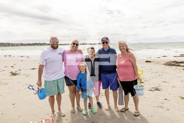 Picture by Sophie Rabey.  23-07-25.  Vazon Bay and Petit Bot have been nominated as two of the Channel Islands top beaches in a recent Country File article.  Vox pop on the beaches.
Clark family on Vazon.