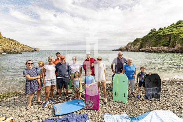 Picture by Sophie Rabey.  23-07-25.  Vazon Bay and Petit Bot have been nominated as two of the Channel Islands top beaches in a recent Country File article.  Vox pop on the beaches.
Baudains/Hitchings family having a day out on Petit Bot.