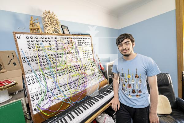 Picture by Sophie Rabey.  23-07-25.  Owen Fraser has been building an analogue synthesiser in his bedroom for two years.  He made most of it from scratch, the wooden frame, power supply and all the circuits, which he soldered himself.