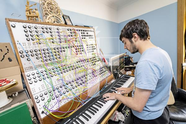 Picture by Sophie Rabey.  23-07-25.  Owen Fraser has been building an analogue synthesiser in his bedroom for two years.  He made most of it from scratch, the wooden frame, power supply and all the circuits, which he soldered himself.