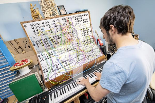Picture by Sophie Rabey.  23-07-25.  Owen Fraser has been building an analogue synthesiser in his bedroom for two years.  He made most of it from scratch, the wooden frame, power supply and all the circuits, which he soldered himself.