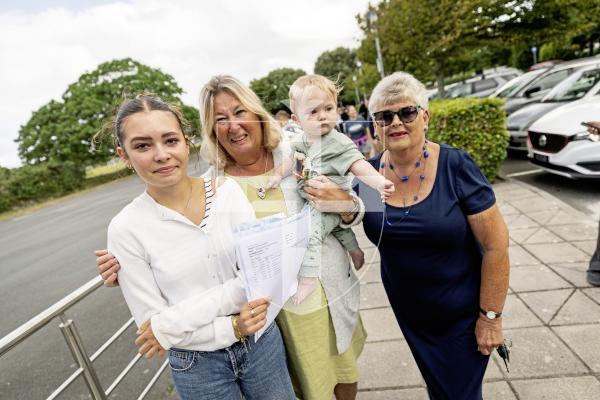 Sophie Rabey.  21-08-25.  GCSE results day.  Les Varendes High School.
Florence Hemery (16) and her family L-R Emma Brouard, baby Bailey (9 months) and Jackie Hemery.  They are all very proud of Florence for getting fantastic results.