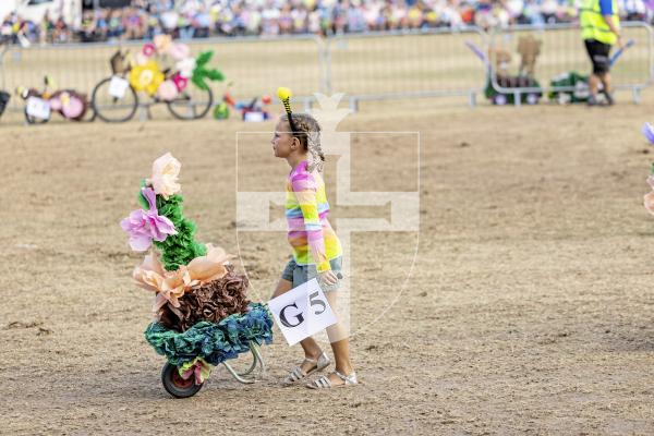 Picture by Sophie Rabey.  21-08-25.  North Show 2025 - Battle of Flowers.
Class G - Decorated Wheelbarrow, any flowers, any age, adult/child.
G5 - Dot - Flower Pot Girls : Daisy Boatwright-Smith
